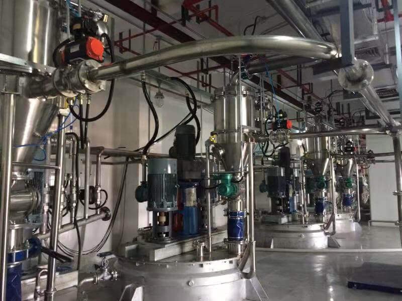 Reaction Vessel Vacuum Feeder